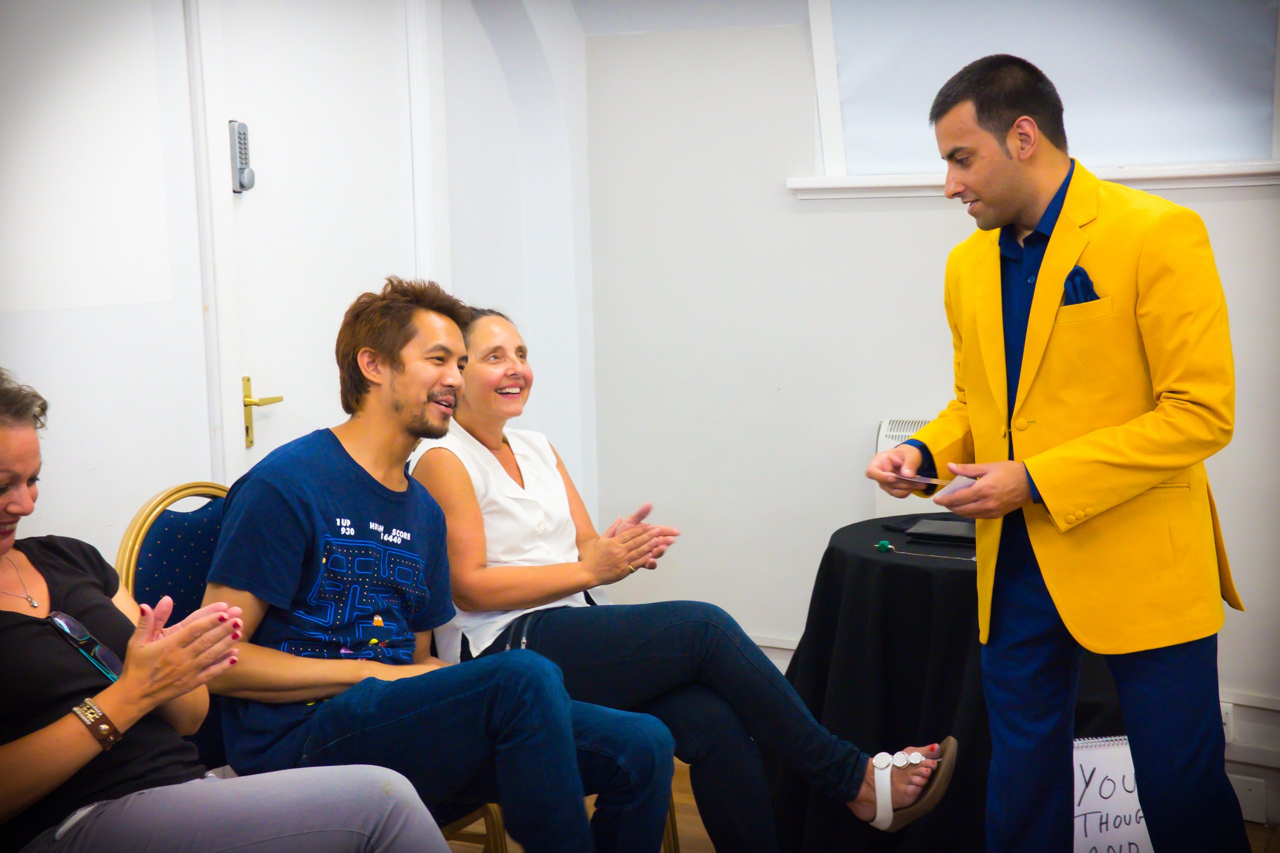 An entertaining presentation on stage! Just look at the smiles and laughter! Magic is a great way to leave a lasting memory and is not only fun, but can also teach people and train businesses